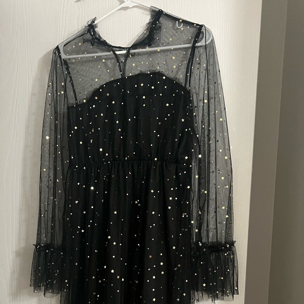 Long black star sparkly dress with ruffle detailing